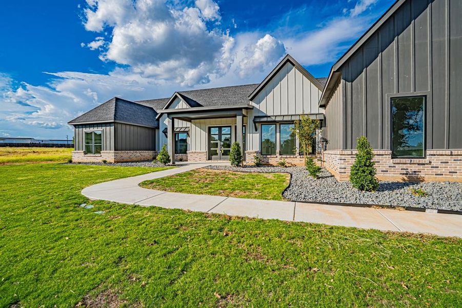 Exterior details and patio area of a home in , Granbury (Image 3). Exterior details and patio area of a home in , Granbury (Image 3).