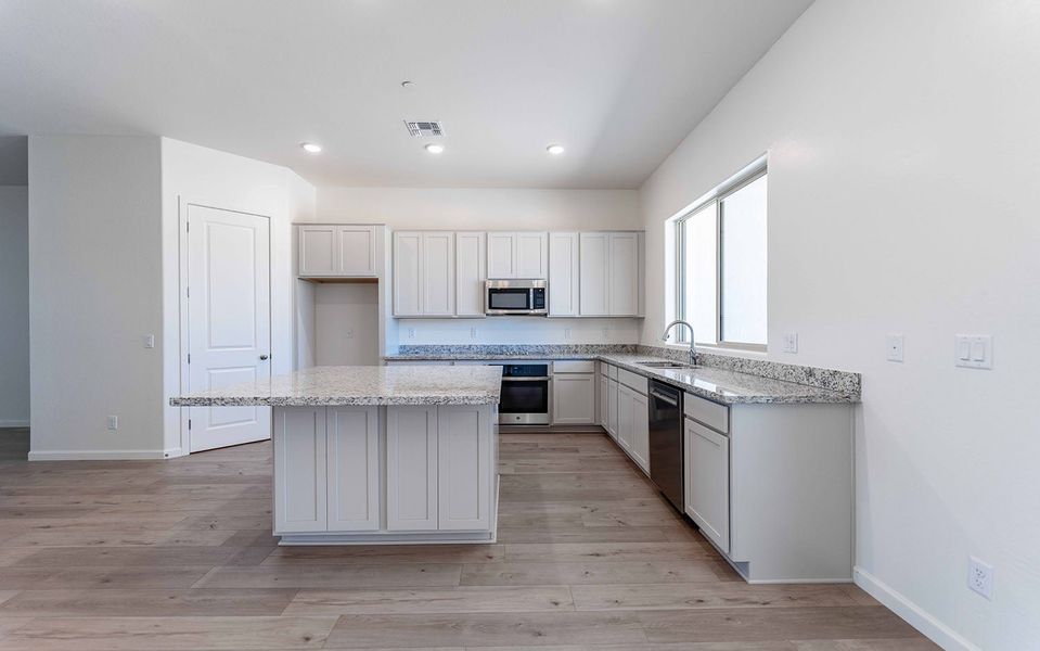 Furnished interior view inside a new home in Heritage Pointe, Chino Valley (Image 4). Furnished interior view inside a new home in Heritage Pointe, Chino Valley (Image 4).