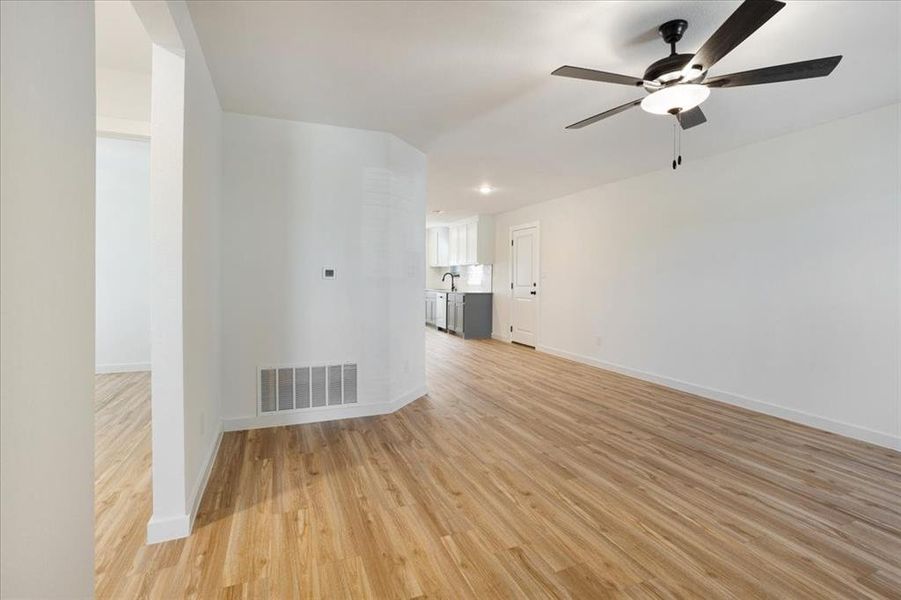 Spacious, unfurnished interior of a new home in Miller Street Cottages, Denison (Image 21).