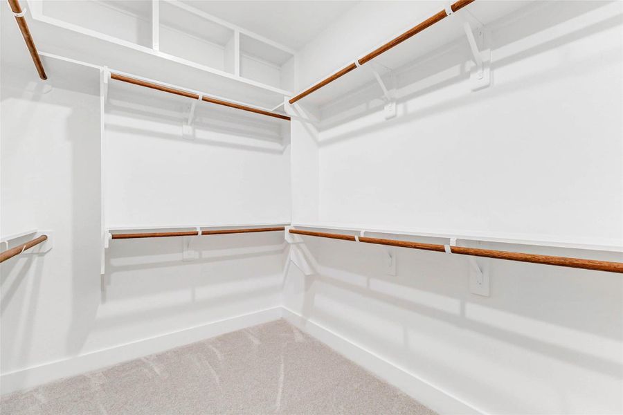 A dream closet — generous hanging space, built-in shelving, and even an extra switch for shelf lighting. A dream closet — generous hanging space, built-in shelving, and even an extra switch for shelf lighting.