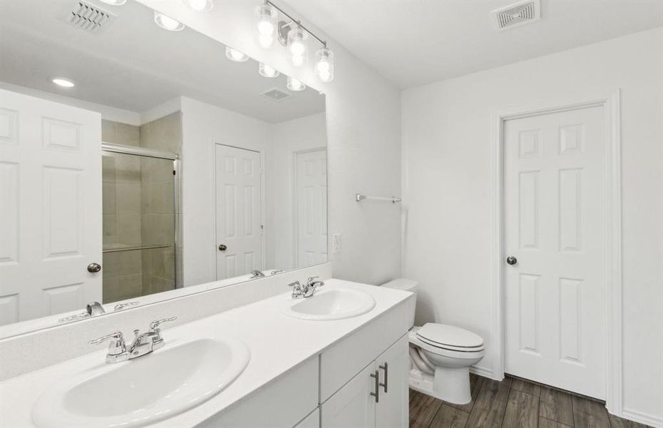 Upgraded secondary bathroom*real home pictured