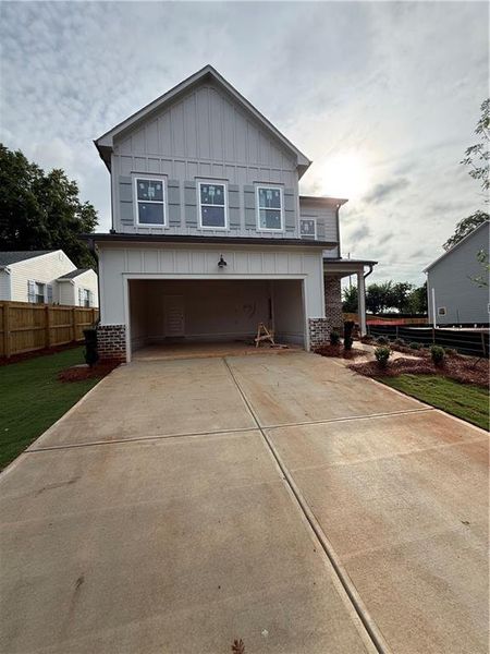 Front exterior of a new home in , Marietta, GA, highlighting curb appeal (Image 2). Front exterior of a new home in , Marietta, GA, highlighting curb appeal (Image 2).