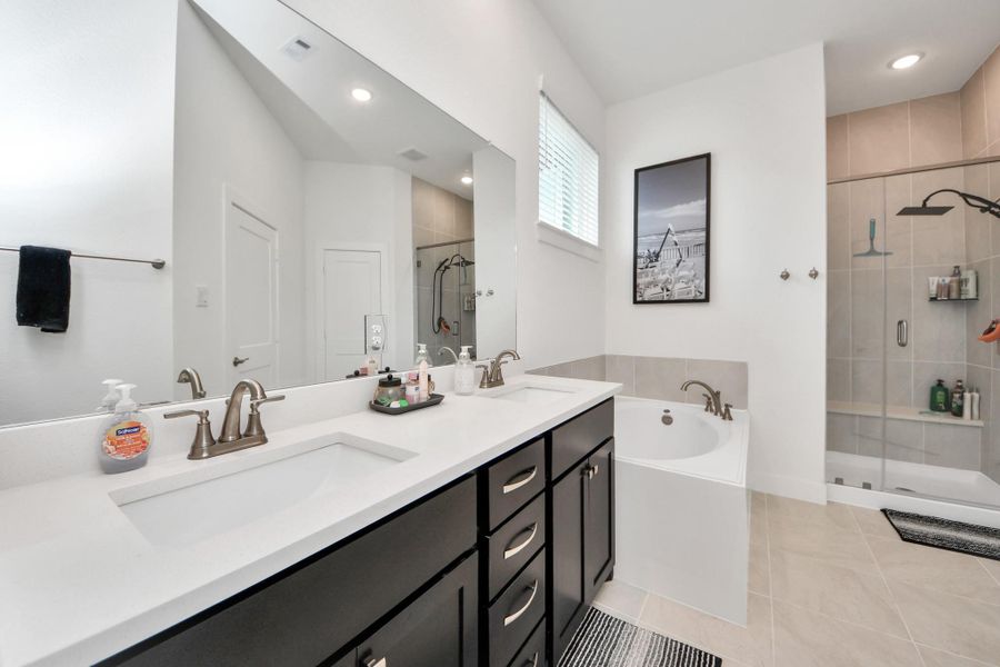 Furnished interior view inside a new home in Meridiana Courtyard Collection, Manvel (Image 35).
