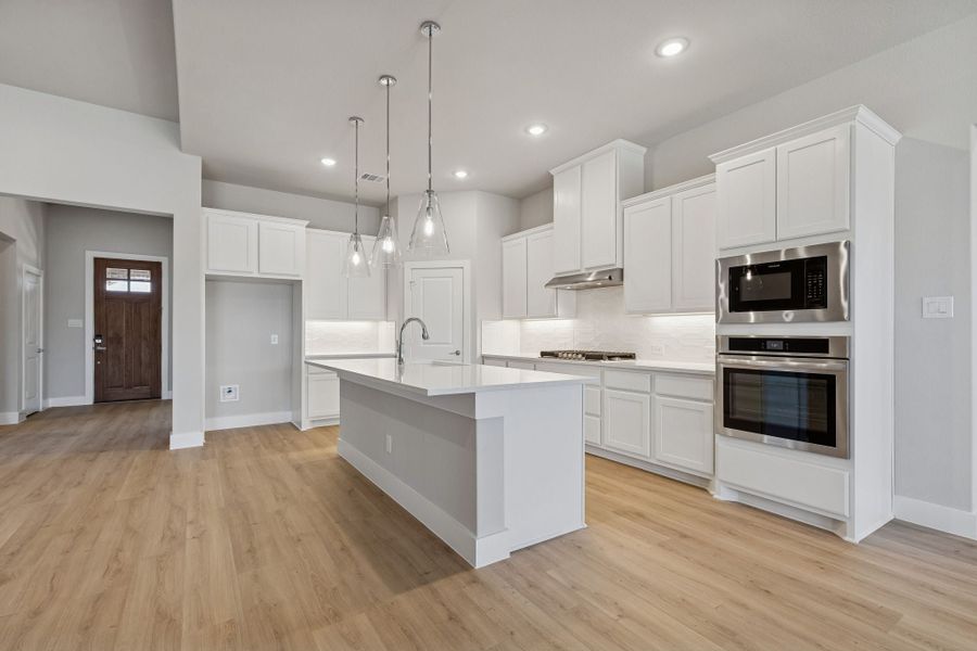Representative furnished interior of a home built from the Halsted by Centre Living Homes in Ellis Ranch Estates, Waxahachie (Image 8).