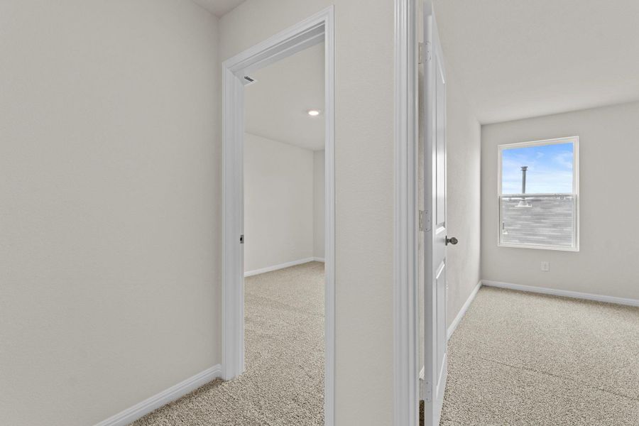 Spacious, unfurnished interior of a new home in Whisper South, San Marcos (Image 22).