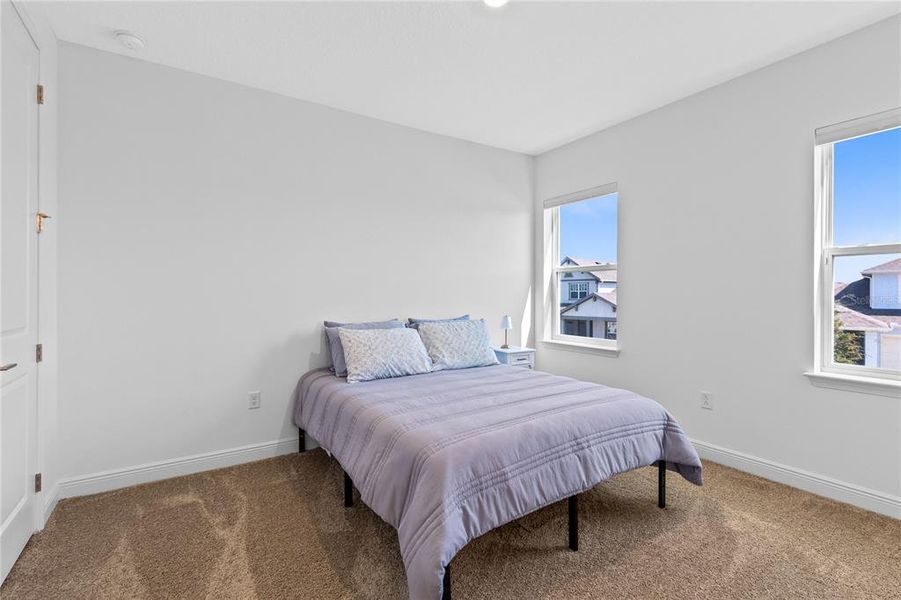 Furnished interior view inside a new home in Laureate Park, Orlando (Image 32).
