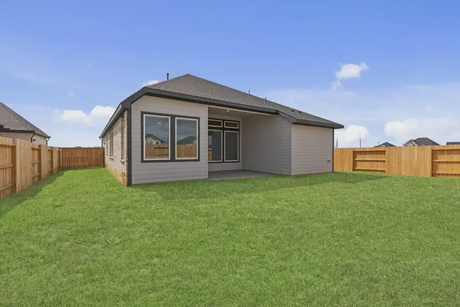 Exterior details and patio area of a home in Attwater 55s, Waller (Image 3).