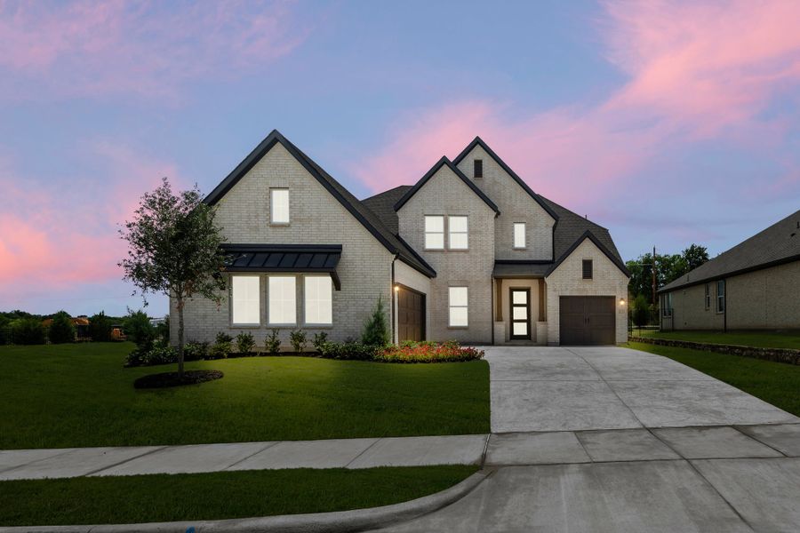 Front exterior of a new home in Nelson Lake Estates, Rockwall, TX, highlighting curb appeal (Image 20). Front exterior of a new home in Nelson Lake Estates, Rockwall, TX, highlighting curb appeal (Image 20).