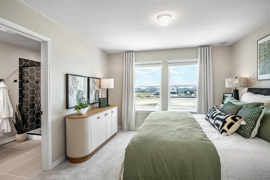 Representative furnished interior of a home built from the 1676 Modeled by KB Home in Medina Crossing - Villa Collection, Von Ormy (Image 9).