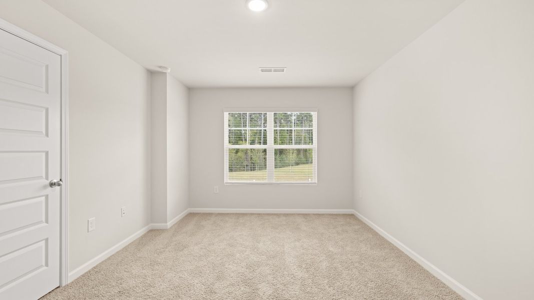 Spacious, unfurnished interior of a new home in Young's Crossing, Stone Mountain (Image 20).