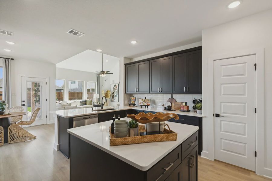 Representative furnished interior of a home built from the Wimberly by Chesmar Homes in Summer Crest, Crowley (Image 7).
