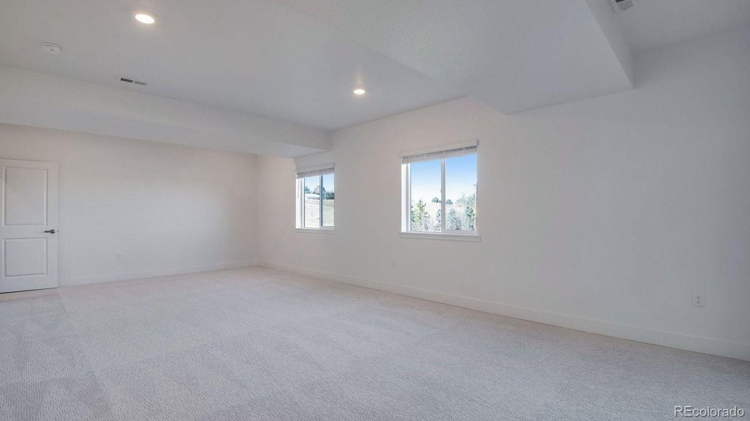 Spacious, unfurnished interior of a new home in Trails at Crowfoot, Parker (Image 26).