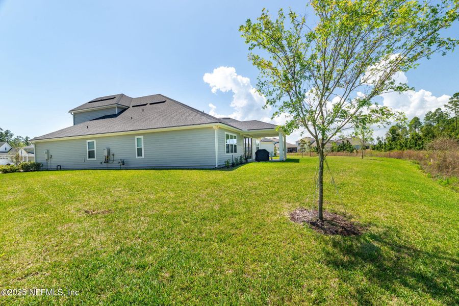 Front exterior of a new home in , St. Augustine, FL, highlighting curb appeal (Image 22).