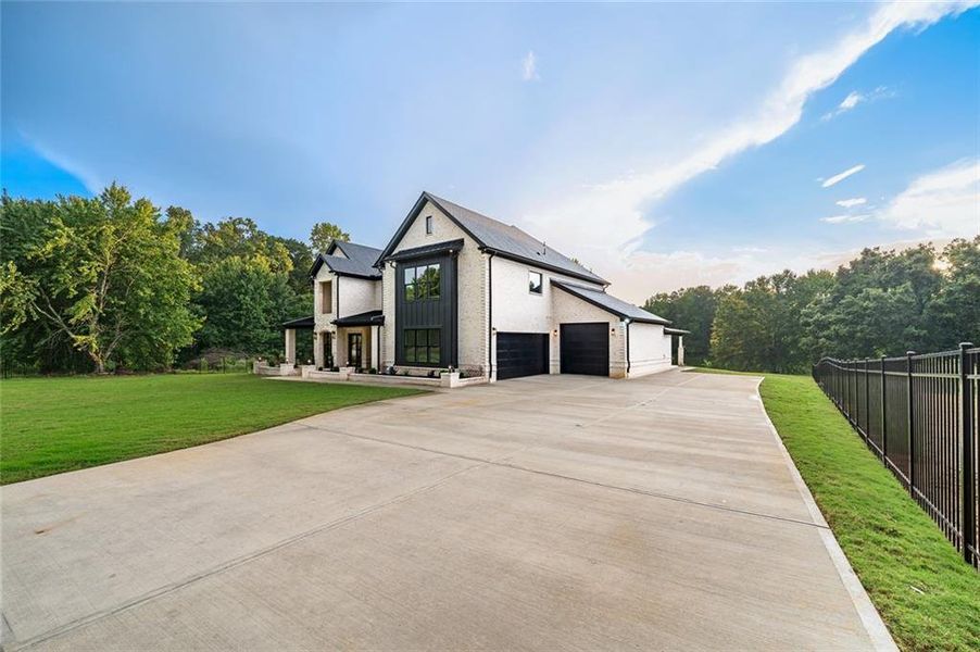 Front exterior of a new home in , Lawrenceville, GA, highlighting curb appeal (Image 20).