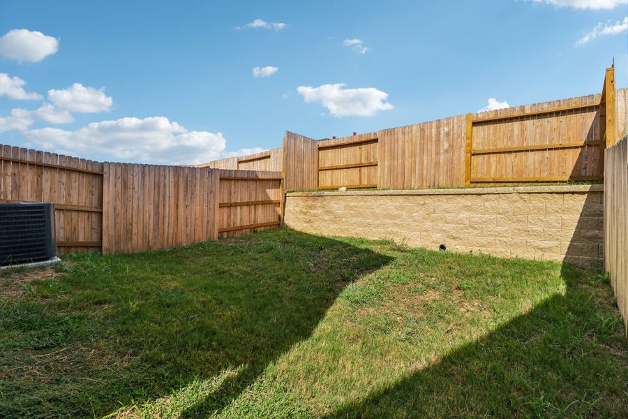 Representative exterior details of a home built from the The Kennedy by Rosehaven Homes in Magnolia Village North, San Antonio (Image 4).
