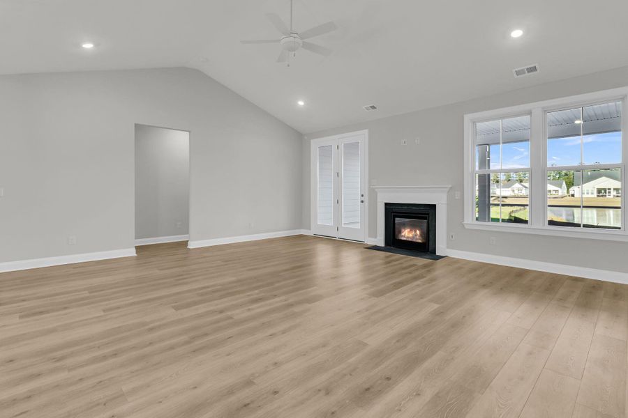 Spacious, unfurnished interior of a new home in Tidewater at Lakes of Cane Bay, Summerville (Image 23).