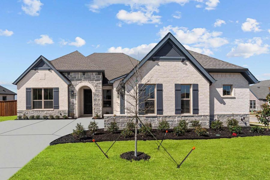 Representative exterior photo of a completed home built from the The Chamberlaine by David Weekley Homes in Redden Farms - Manor Series, Midlothian, TX (Image 1). Representative exterior photo of a completed home built from the The Chamberlaine by David Weekley Homes in Redden Farms - Manor Series, Midlothian, TX (Image 1).