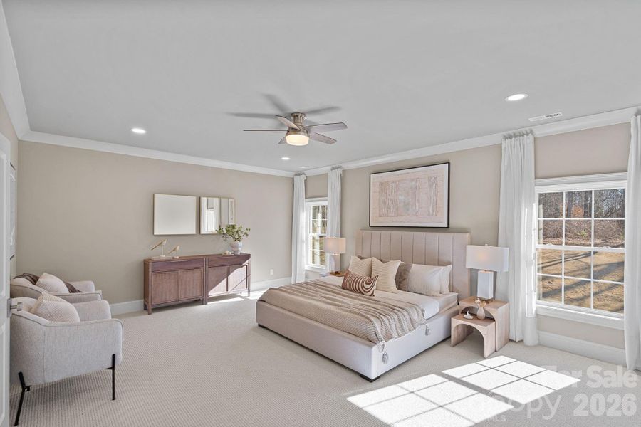 A serene Primary retreat offering space, comfort, and tranquility. With added insulation, this peaceful sanctuary is your perfect place to unwind.