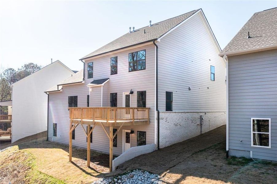 Front exterior of a new home in , Douglasville, GA, highlighting curb appeal (Image 2).
