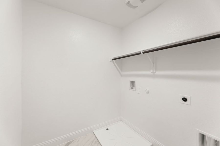 Front exterior of a new home in Main Street Village, Mansfield, TX, highlighting curb appeal (Image 26). Front exterior of a new home in Main Street Village, Mansfield, TX, highlighting curb appeal (Image 26).