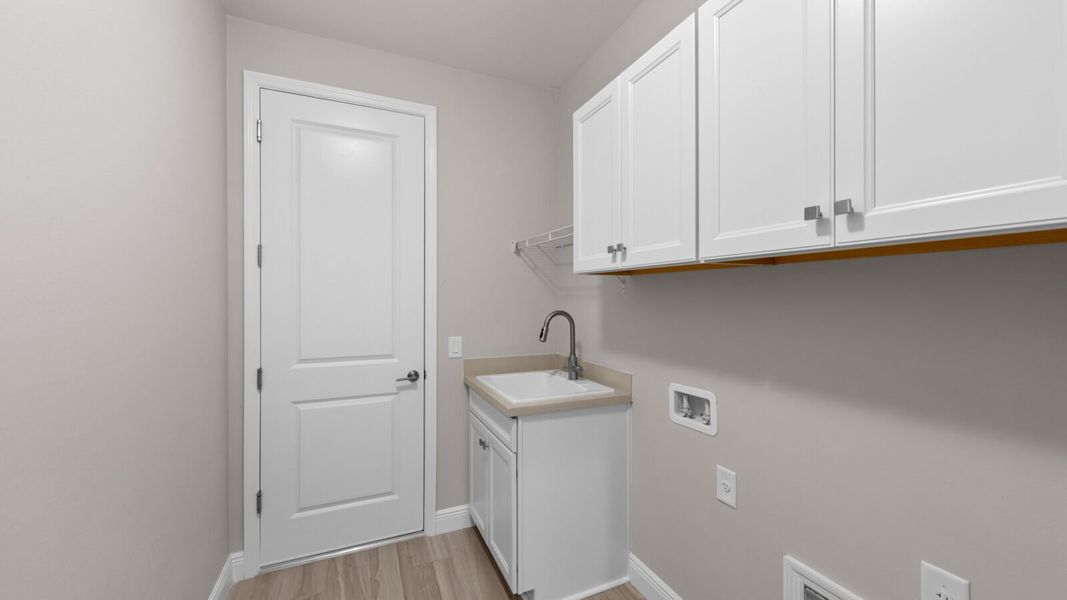 Furnished interior view inside a new home in SkySail, Naples (Image 10).