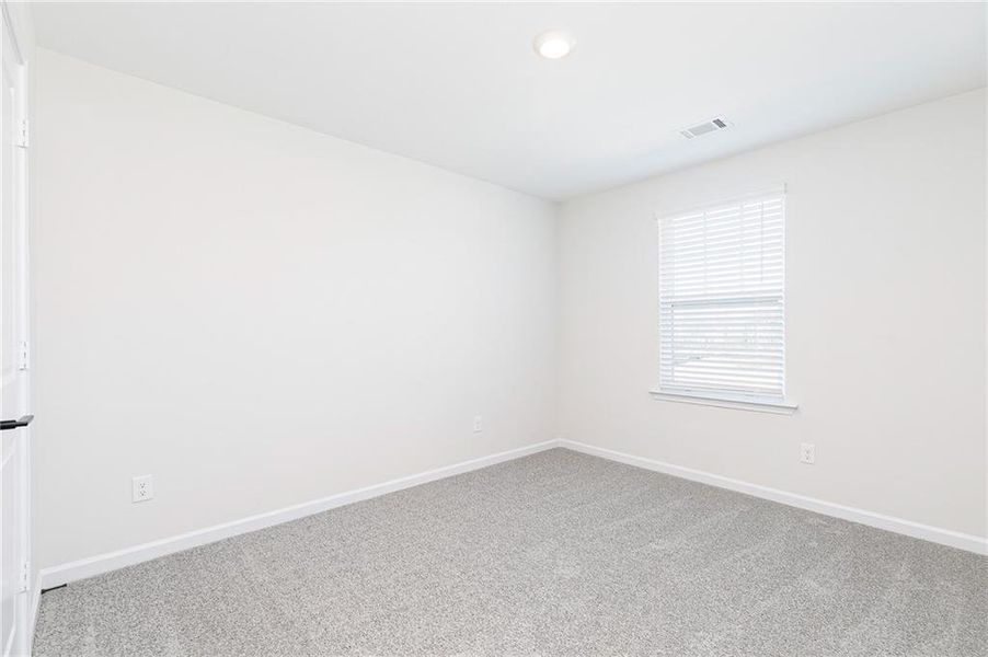 Spacious, unfurnished interior of a new home in Lake Preserve at Jackson Trail, Jefferson (Image 18).