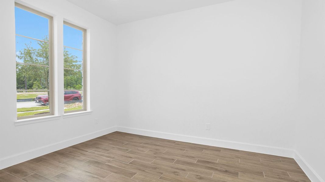 Spacious, unfurnished interior of a new home in Legacy Prairie at Katy Court, Katy (Image 12).