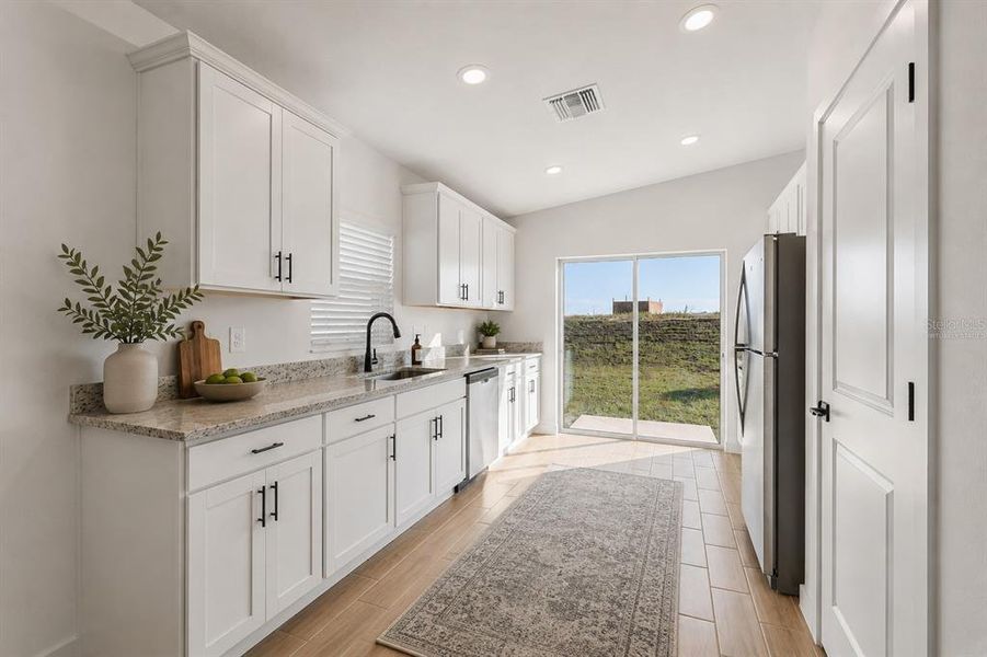 Furnished interior view inside a new home in , Weeki Wachee (Image 4).