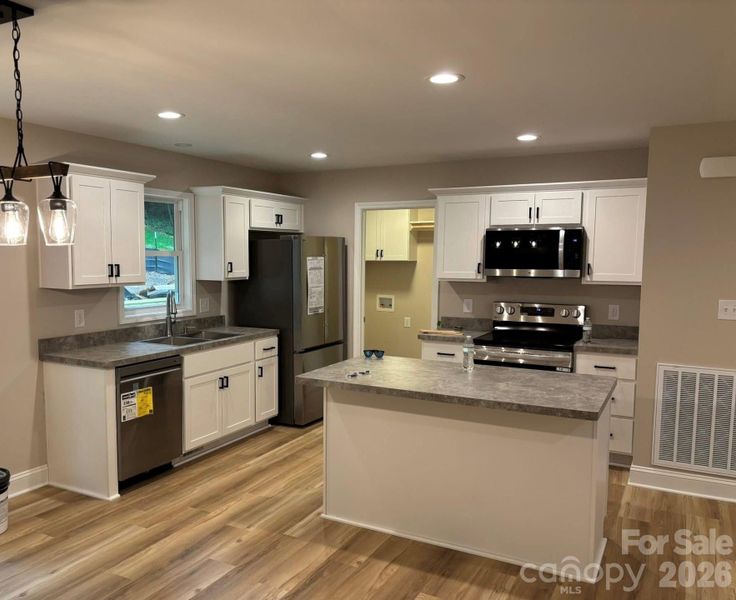 Furnished interior view inside a new home in , Albemarle (Image 5).