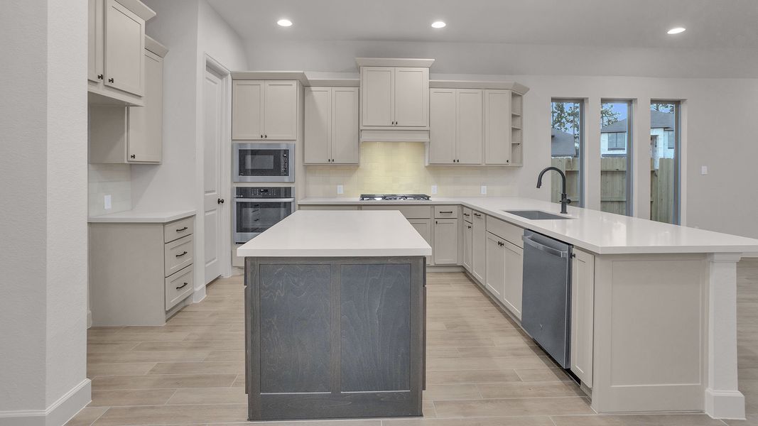 Furnished interior view inside a new home in Grand Central Park, Conroe (Image 9).