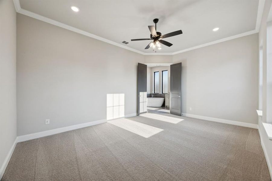 Spacious primary bedroom.