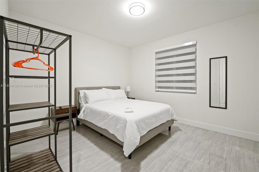 Furnished interior view inside a new home in , Miami Springs (Image 15).