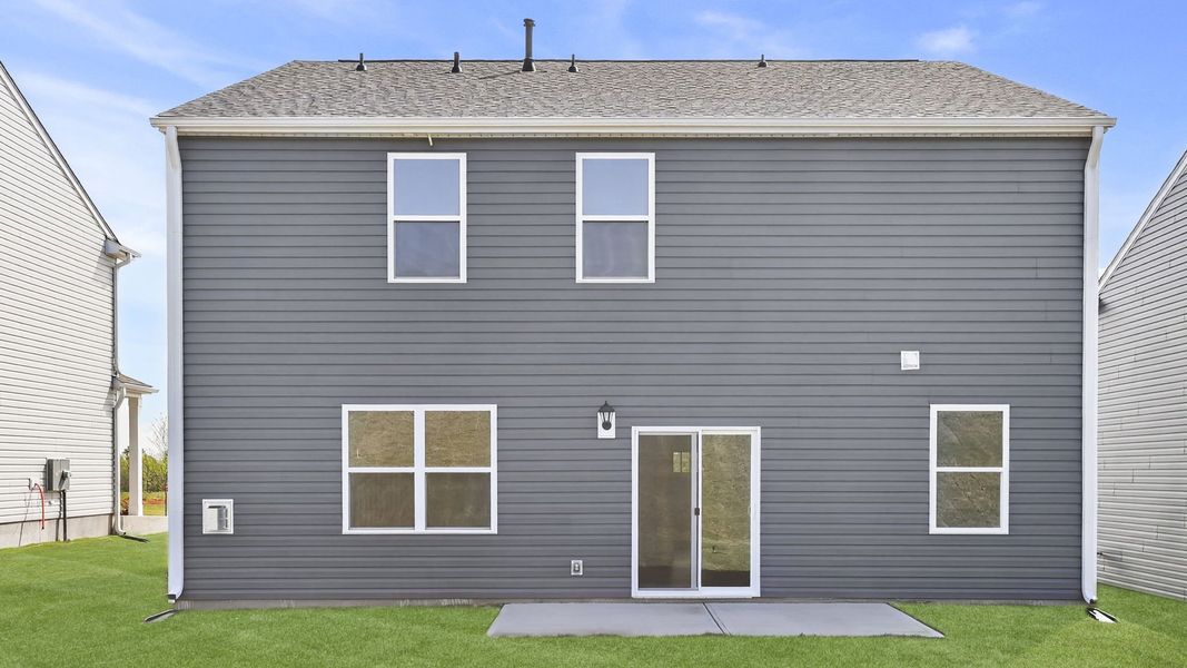 Exterior details and patio area of a home in Hunters Ridge, Woodruff (Image 3).