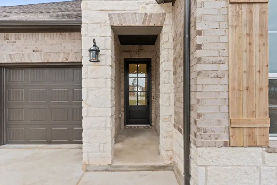 Representative exterior details of a home built from the Waterville by Ashton Woods in The Trails at Carmel, Pflugerville (Image 3).