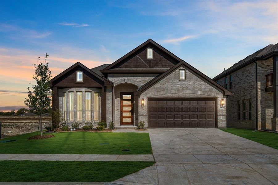 Front exterior of a new home in Anderson Crossing, Trenton, TX, highlighting curb appeal (Image 2). Front exterior of a new home in Anderson Crossing, Trenton, TX, highlighting curb appeal (Image 2).