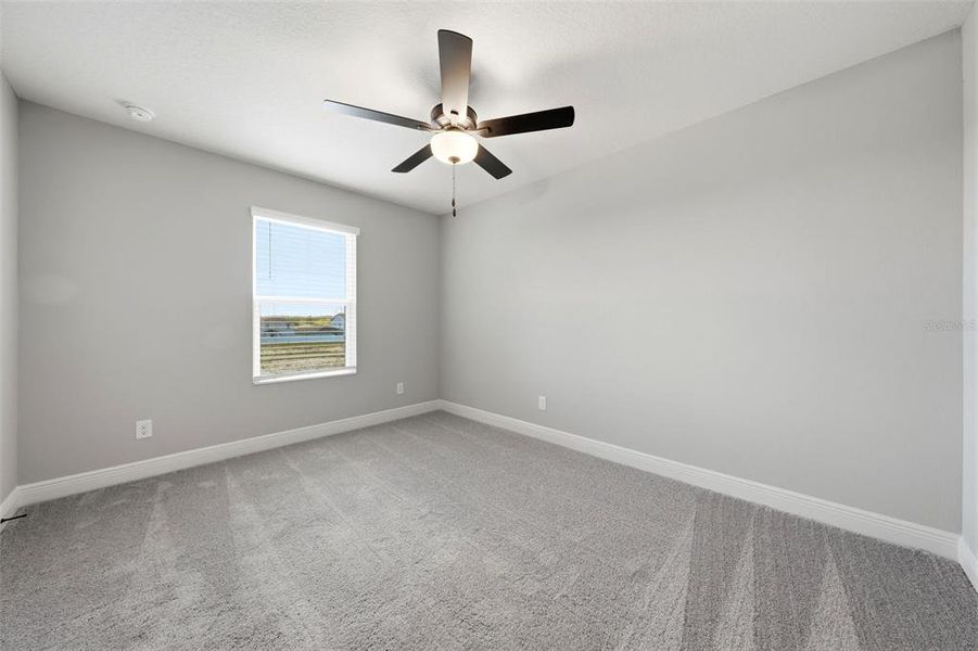 Spacious, unfurnished interior of a new home in Gum Lake Preserve, Lake Alfred (Image 55).