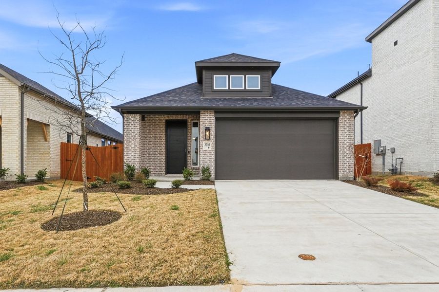 Front exterior of a new home in Heartland, Heartland, TX, highlighting curb appeal (Image 1). Front exterior of a new home in Heartland, Heartland, TX, highlighting curb appeal (Image 1).