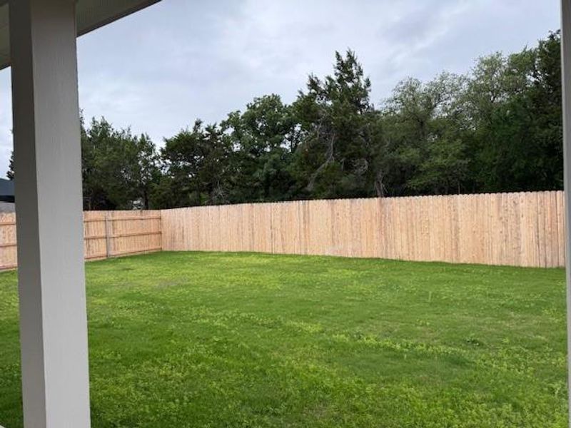 Exterior details and patio area of a home in Grande Estates, Bertram (Image 4).