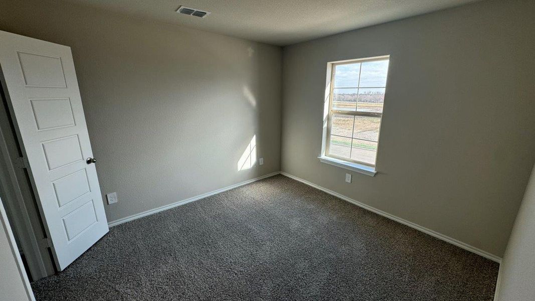 Spacious, unfurnished interior of a new home in Monarch at the Meadows, Krum (Image 13).
