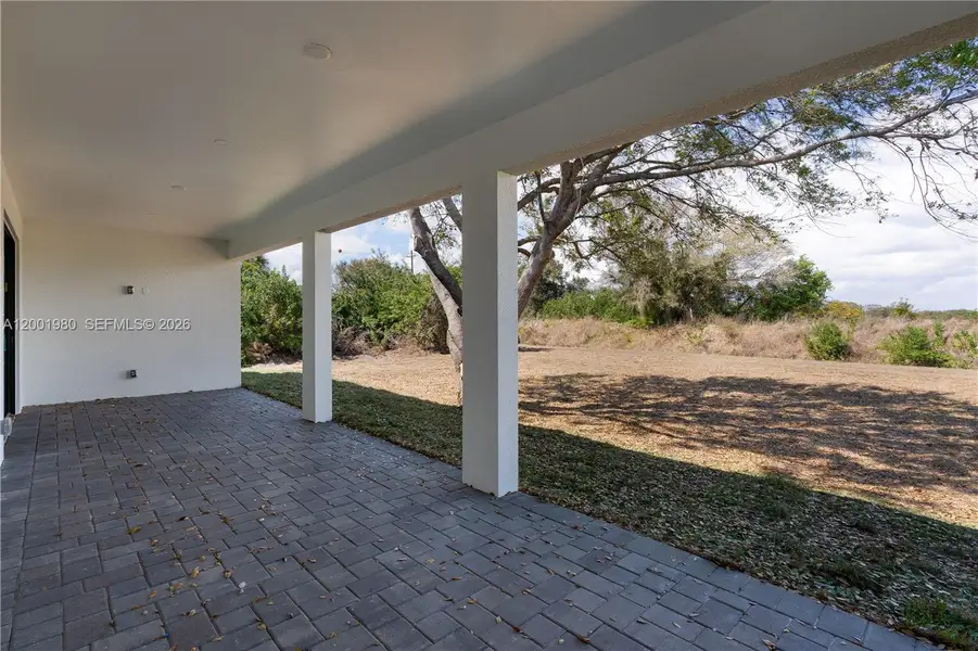 Exterior details and patio area of a home in , Lehigh Acres (Image 3).