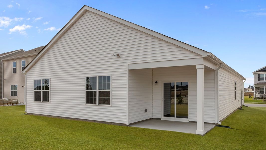 Exterior details and patio area of a home in Ridgewood Farms, Winterville (Image 21).