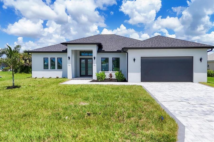 Front exterior of a new home in , Rotonda West, FL, highlighting curb appeal (Image 21). Front exterior of a new home in , Rotonda West, FL, highlighting curb appeal (Image 21).