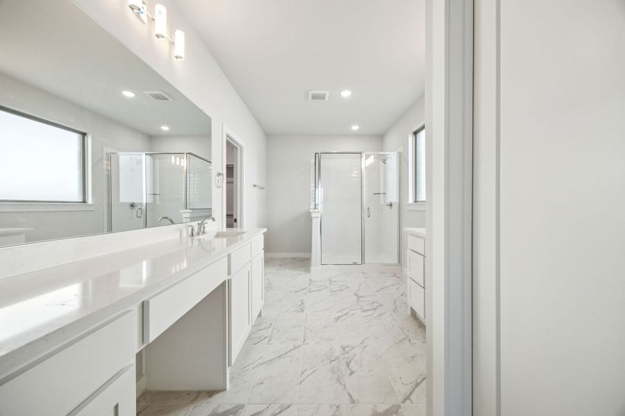 Primary Bathroom in the Wimbledon home plan by Trophy Signature Homes – REPRESENTATIVE PHOTO