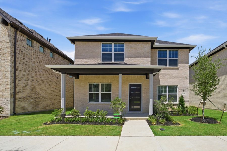 Front exterior of a new home in La Terra, Celina, TX, highlighting curb appeal (Image 1). Front exterior of a new home in La Terra, Celina, TX, highlighting curb appeal (Image 1).