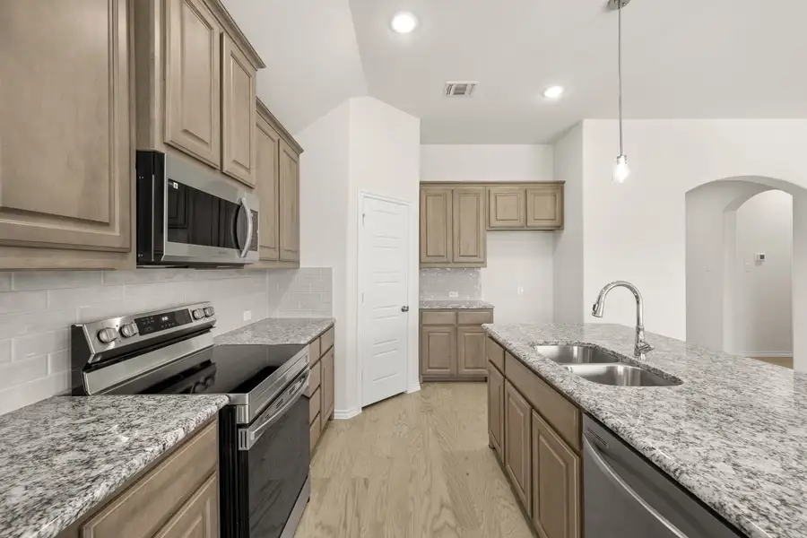 Furnished interior view inside a new home in Summer Crest, Fort Worth (Image 6). Furnished interior view inside a new home in Summer Crest, Fort Worth (Image 6).