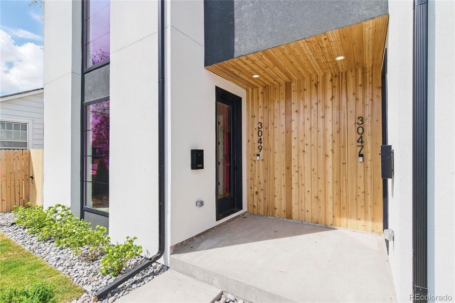 Exterior details and patio area of a home in , Englewood (Image 3).