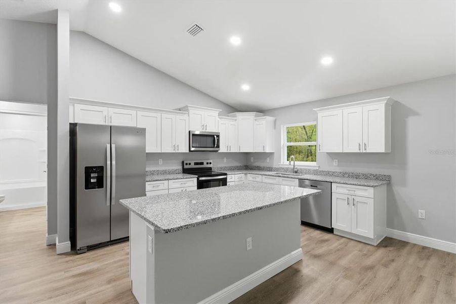 Furnished interior view inside a new home in , Dunnellon (Image 7).