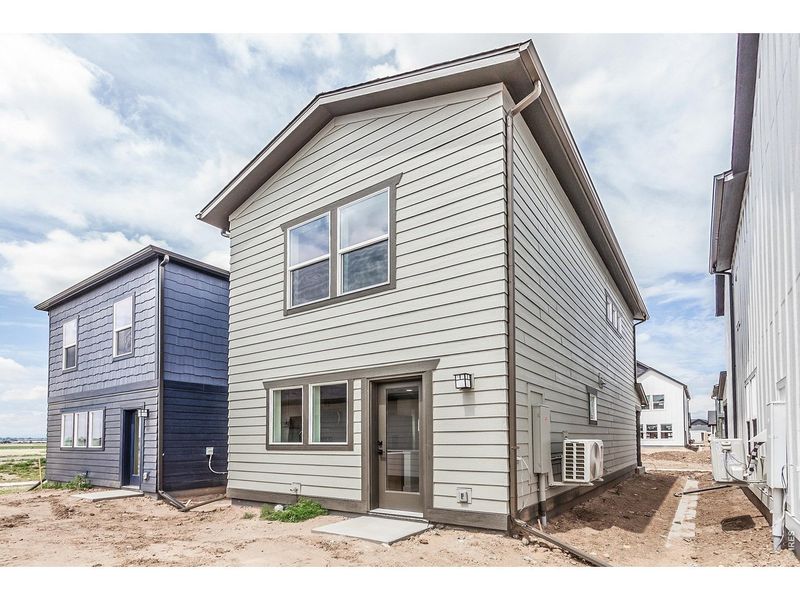 Exterior details and patio area of a home in Prairie Song Story Collection - Single Family Homes, Windsor (Image 3).