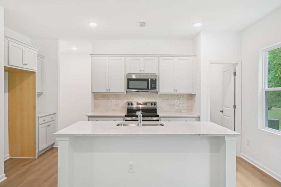 Representative furnished interior of a home built from the Brooke by Ashton Woods in Middleton Farms, Middlesex (Image 2).