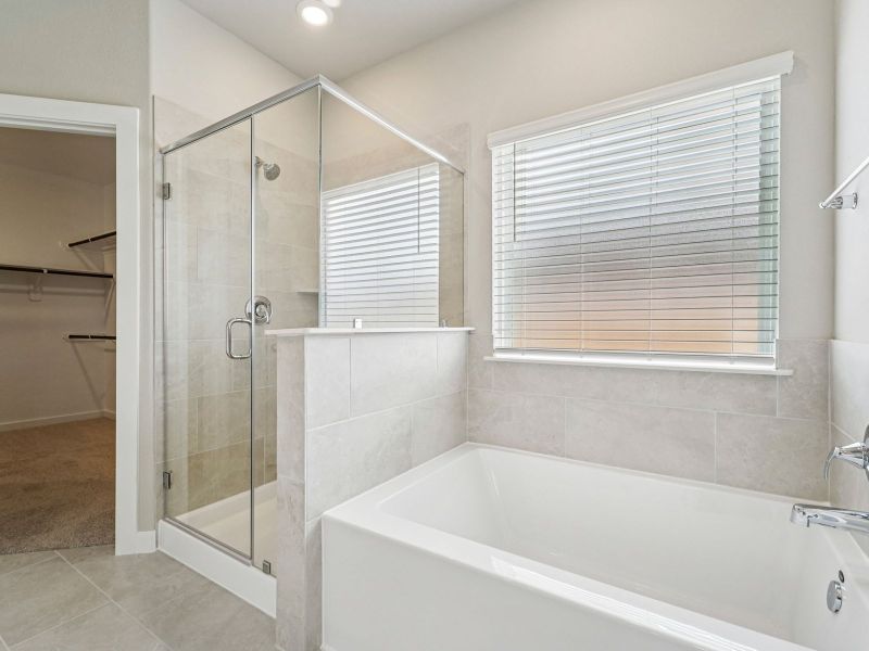 Furnished interior view inside a new home in Heights of Barbers Hill, Mont Belvieu (Image 9).